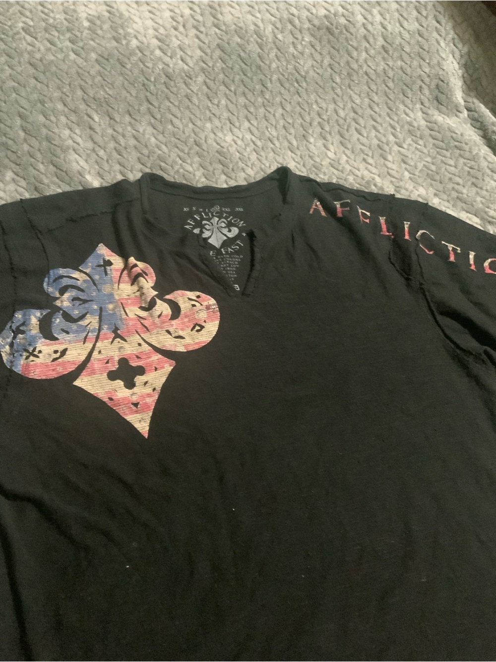 Affliction Black Short-Sleeve V-Neck Shirt with Distressed Flag Fleur-de-Lis